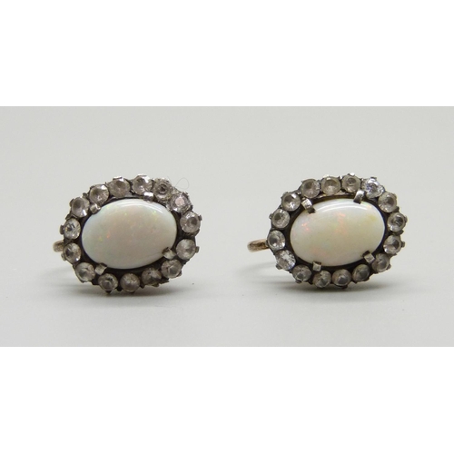 971 - A pair of opal and white stone cluster earrings, marked 375