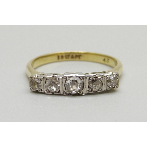 972 - An Art Deco 18ct gold and platinum set five stone diamond ring, 2.7g, L