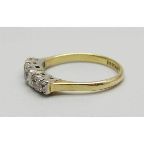 972 - An Art Deco 18ct gold and platinum set five stone diamond ring, 2.7g, L