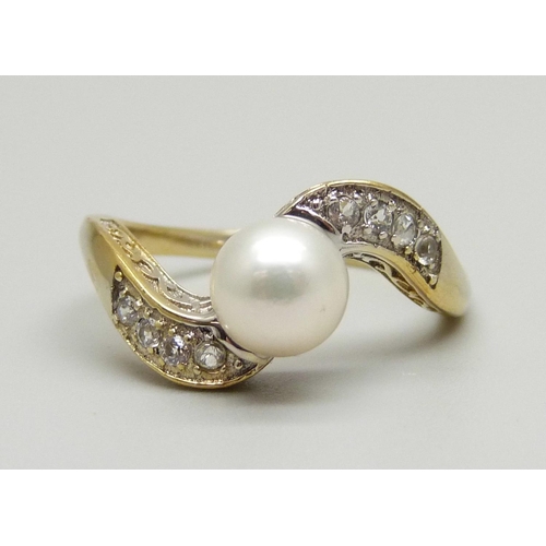 974 - A silver gilt, pearl and zircon ring, R