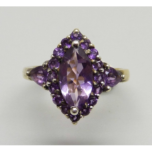 978 - A silver gilt and amethyst marquise cluster ring, P