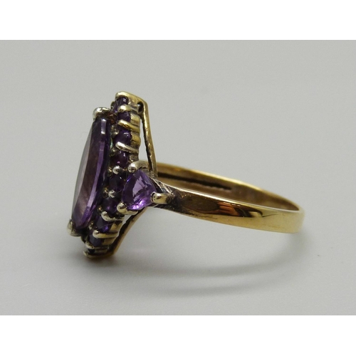 978 - A silver gilt and amethyst marquise cluster ring, P