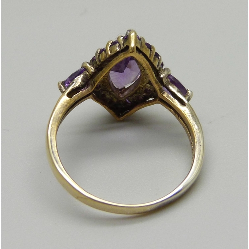 978 - A silver gilt and amethyst marquise cluster ring, P