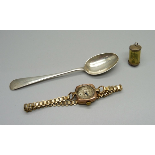 981 - A 9ct gold cased Rotary wristwatch, a/f, a silver spoon and a silver £1 charm