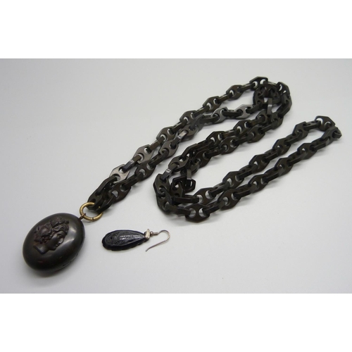 988 - A Victorian jet long guard chain and locket, locket hinge sale