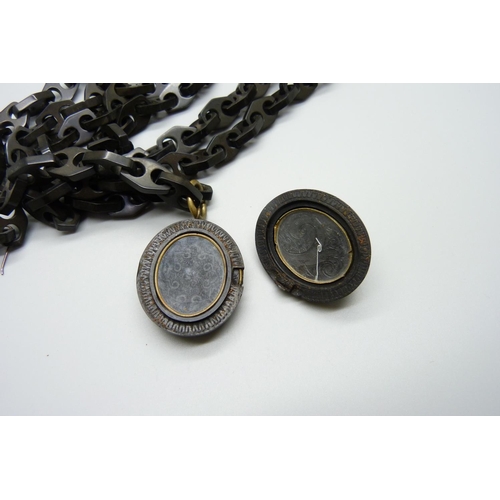 988 - A Victorian jet long guard chain and locket, locket hinge sale