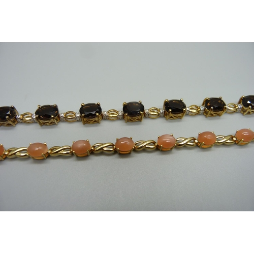 991 - A silver gilt and smoky quartz bracelet and a silver gilt and mitiyagoda peach moonstone bracelet