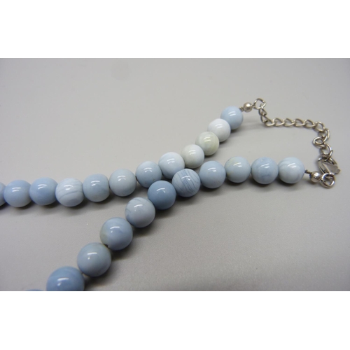 997 - A 140ct African blue opal necklace