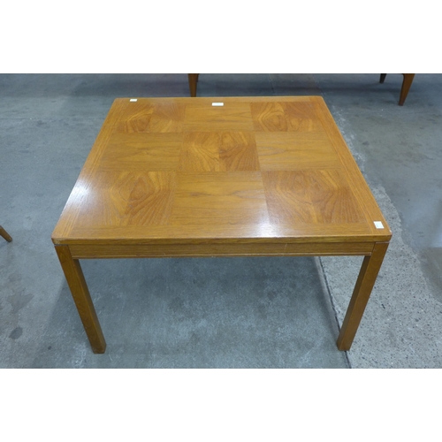 11 - A Norwegian Heggan teak patchwork top coffee table