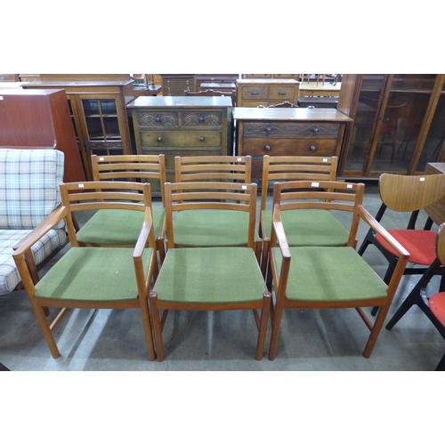 12 - A set of six Danish teak dining chairs