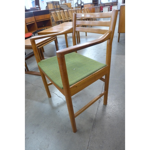 12 - A set of six Danish teak dining chairs