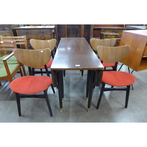 13 - A G-Plan Librenza tola wood and black drop leaf table and four butterfly-back chairs