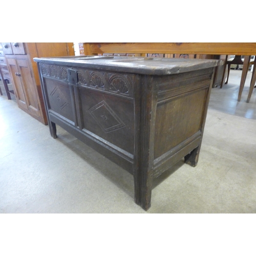 132 - A William III carved oak coffer