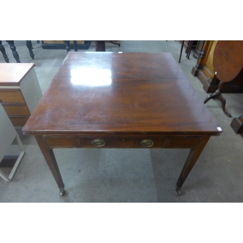 136A - A George IV mahogany library table