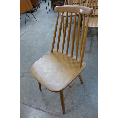 15 - A set of sixteen Scandinavian beech chairs