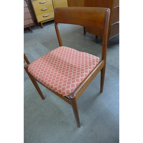 17 - A Dalescraft teak extending dining table and four chairs, designed by Malcolm Walker