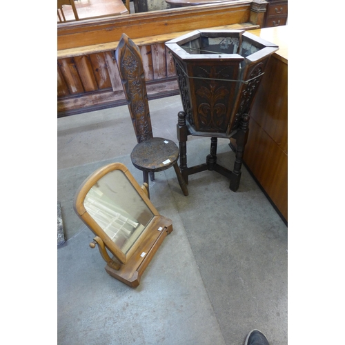 177 - A Victorian carved oak jardiniere on stand, a spinning stool and a toilet mirror