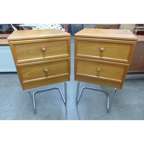 18 - A pair of G-Plan teak chests on chrome stands