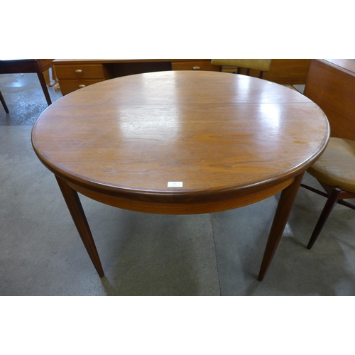 2 - A G-Plan Fresco teak circular extending dining table and six chairs