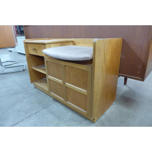 23 - A Nathan teak telephone seat