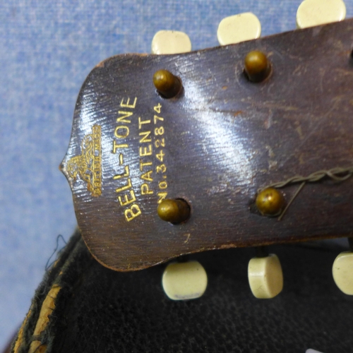 280 - A Bell Tone banjo, cased