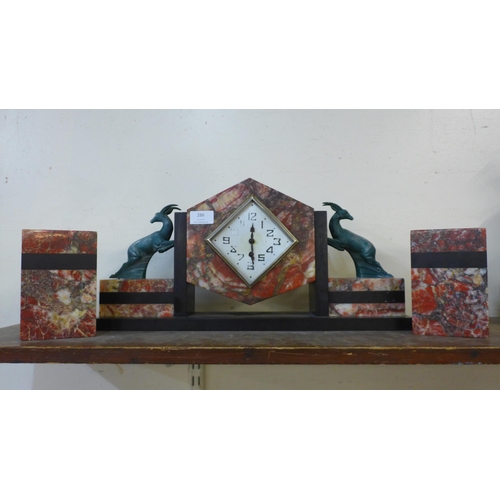 286 - A French Art Deco marble clock garniture