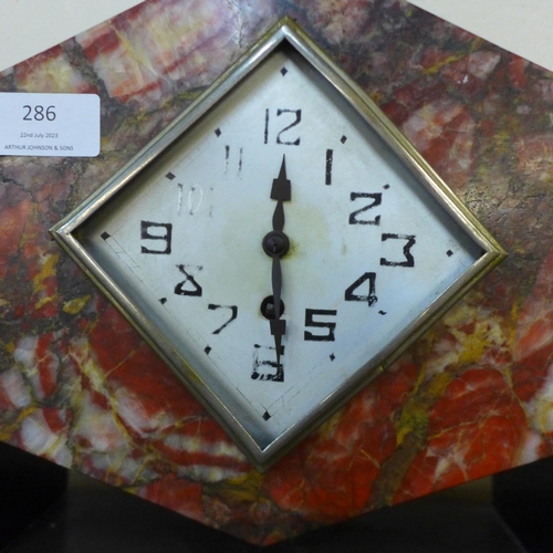 286 - A French Art Deco marble clock garniture