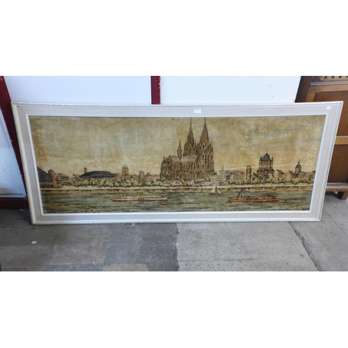 289 - A German woollen tapestry, depicting Cologne, framed