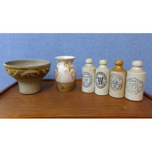 294 - Assorted stoneware flagons, a vase and a bowl