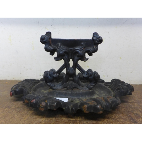 296 - A Victorian cast iron boot scraper