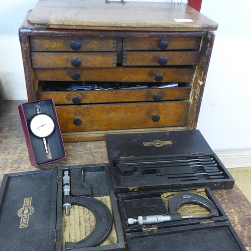 297 - A vintage table top engineer's tool chest, with tools