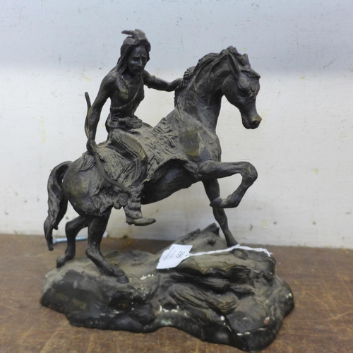 299 - A French bronze figure of a native American, signed Arnoux, Paris