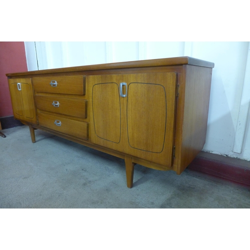 31 - A teak sideboard