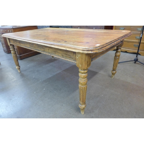 54 - A Victorian style waxed pine farmhouse kitchen table, 71cms h, 171cms l, 103cms w