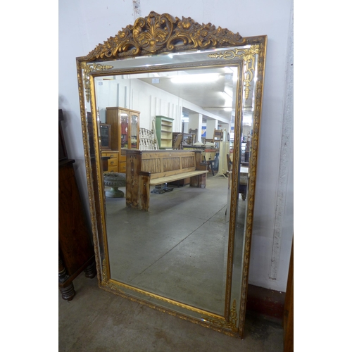 58 - A large French style gilt framed mirror, 167 x 101cms