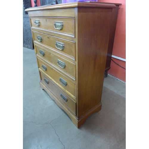 59 - A Victorian oak chest of drawers