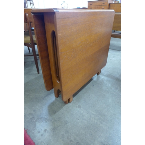 6 - A Jentique teak drop-leaf table