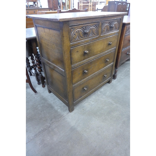 67 - A 17th Century style carved Ipswich oak chest of drawers