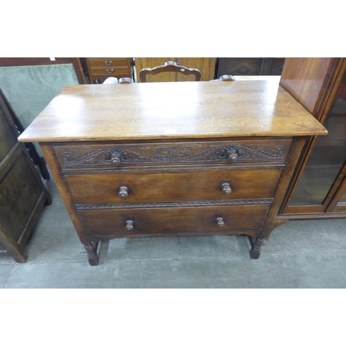 68 - A 17th Century style carved Ipswich oak chest of drawers