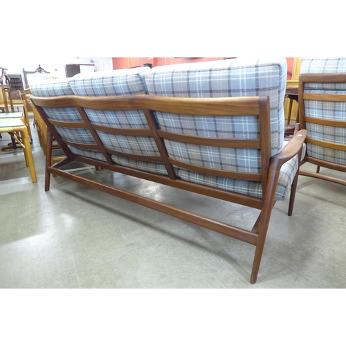 7 - A Guy Rogers teak New Yorker settee and pair of armchairs, designed by George Fejer and Eric Phamphi... 