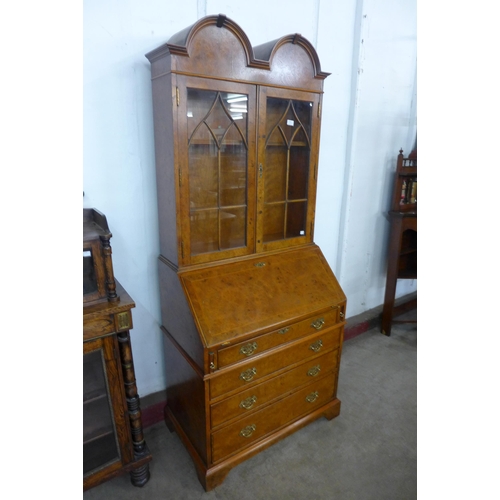 78 - A George I style burr elm bureau bookcase