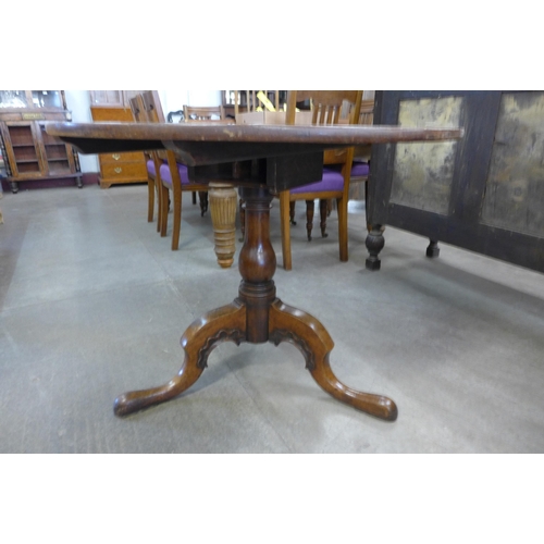 96 - A George III mahogany circular tilt-top birdcage action tripod tea table