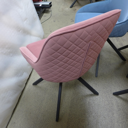 1531 - A pair of pink swivel dining chairs * this lot is subject to VAT