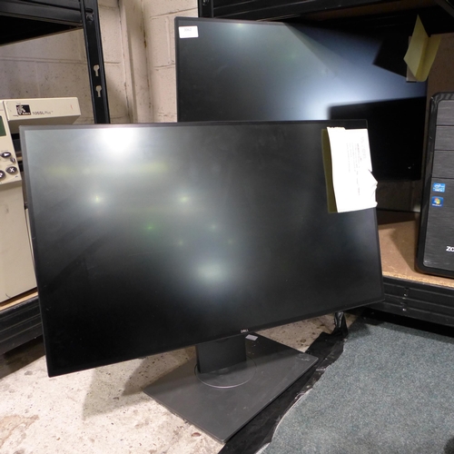 3062 - Two Dell Flat Panel Computer Monitors on Adjustable Swivel Stands * this lot is subject to VAT