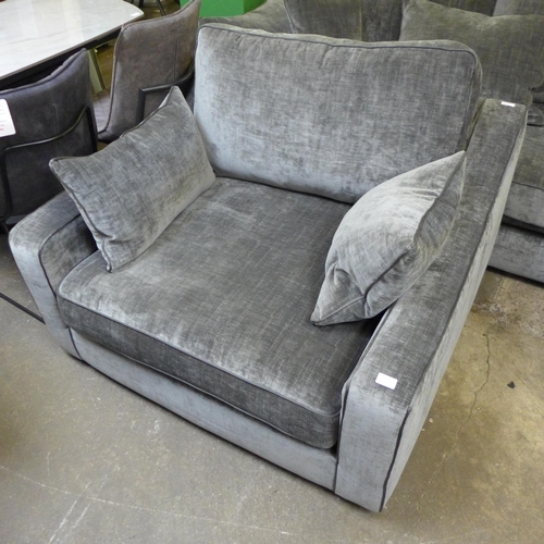 1474 - A pewter velvet 'L' shaped sofa and armchair - damaged feet on leg rest