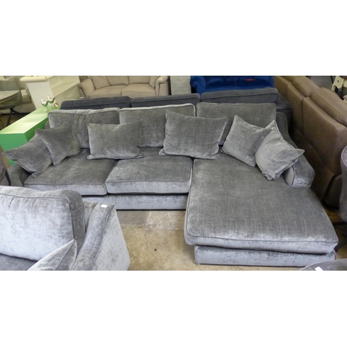 1474 - A pewter velvet 'L' shaped sofa and armchair - damaged feet on leg rest