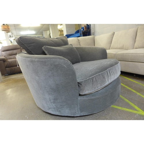 1506 - A pewter velvet swivel love seat