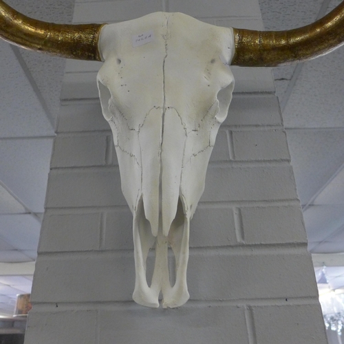 1426A - A decorative wall hanging Bison skull