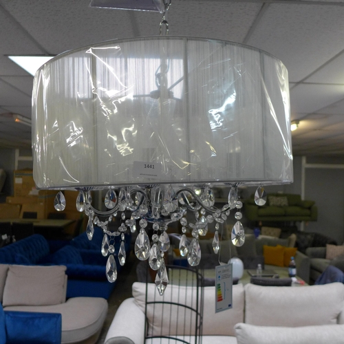 1441 - A chandelier with white shade