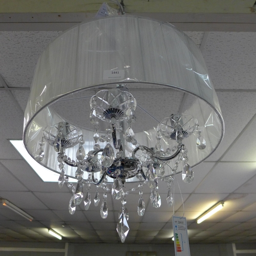 1441 - A chandelier with white shade